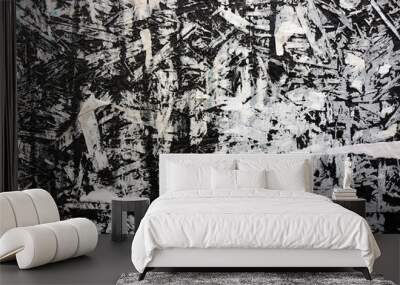 Black and white grungy backgroud. Old surface of leftovers from posters. Wall mural