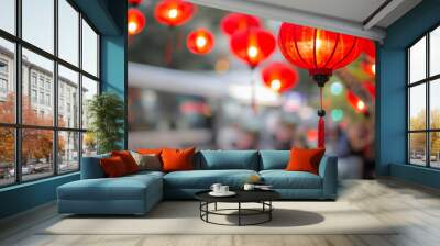 Beautiful traditional lanterns hanging from a tree during Chinese lunar new year. Wall mural