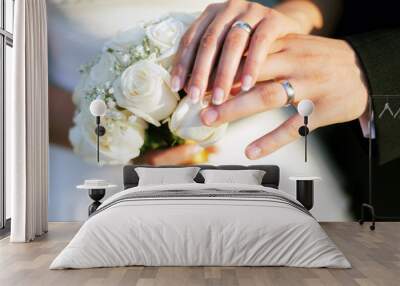 Wedding rings and hands Wall mural