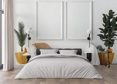 A minimalist interior features a white sofa, neutral decor, and lush green plants, creating a serene and stylish setting with a warm, cozy atmosphere. Wall mural