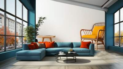 A stylish chair with a yellow cushion next to a plant and table, epitomizing modern elegance and minimalist design in a spacious, well-lit interior setting. Wall mural