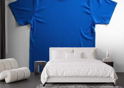 Vibrant royal blue crew neck t shirt on white background for casual wear Wall mural