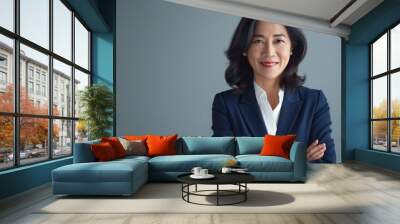 Confident MiddleAged Filipino Businesswoman in Professional Attire for Corporate, Marketing, and Diversity Use Wall mural