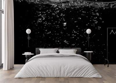 Water bubbles floating on black background which represent refreshing of refreshment from soda or carbonated drink and power of liquid that splashing or fizzing with blowing and streaming by air pump. Wall mural