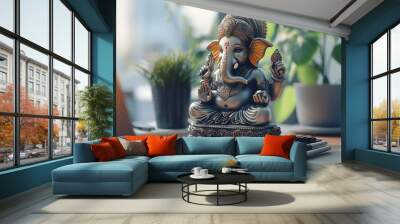 Ganesha Statue on Modern Desk with Laptop and Plants. Wall mural