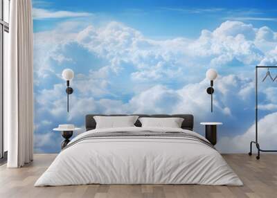 White clouds on blue sky background, cloudy sky view from airplane Wall mural