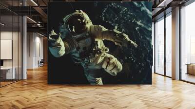 astronaut in space suit and helmet floating on the Earth orbit, space exploration concept Wall mural