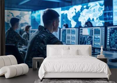 military operator monitoring battle information in control room with screens and displays, future army and security concept Wall mural