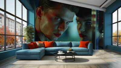 mirror reflection of young stylish couple of man and woman, mysterious gaze and and cold serious faces, cinematic light Wall mural