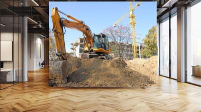 excavator on construction site industry Wall mural