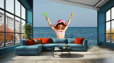 happy little girl on beach summer scene Wall mural