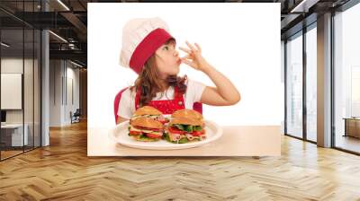 little girl cook with ok hand sign and sandwiches Wall mural