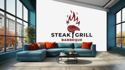 grill barbeque barbecue with crossed fork and fire flame logo vector illustration. beef steak barbecue logo template Wall mural