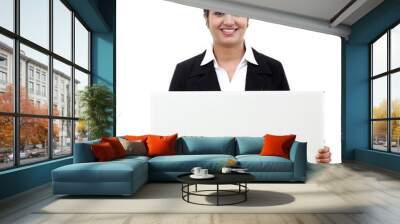 Young happy business woman holding blank signboard Wall mural