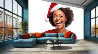 Isolated portrait of an excited satisfied happy laughing black woman with open mouth wearing a Christmas santa hat on a transparent background Wall mural