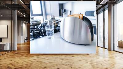 Silver toaster for making breakfast toast in the kitchen. Household and kitchen appliance for cooking food Wall mural