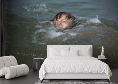 the danger that the child plays under water without supervision of an adult, it covers the waves, sinks Wall mural