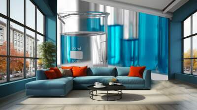 Liquid purifying chemical in glass beaker Wall mural