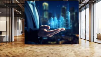 Hologram modern buildings on businessman hands with modern city building background Wall mural