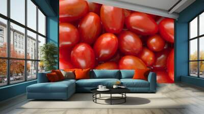 Shiny fresh red plum cherry tomatoes on the market. Close up. Macro. Wall mural