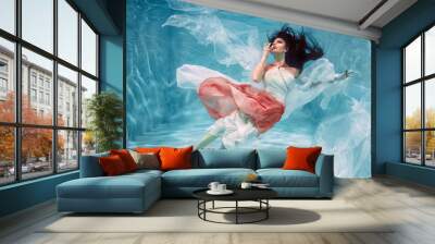 Hot Slim Brunette Woman Posing Under water in beautiful clothes alone in the deep Wall mural