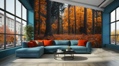 A vibrant autumn forest showcasing a variety of trees displaying fiery orange and yellow foliage. Wall mural