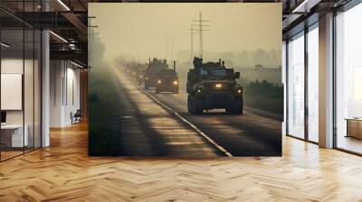 two military vehicles driving down the road in the foggy mist, with trees and power lines on either sides Wall mural