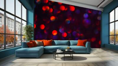 Abstract blurred glittering shine, violet and red. Blur light bokeh, night background. Christmas wallpaper decorations concept. New year holiday festive backdrop. Sparkle circle celebrations display. Wall mural