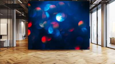 Abstract blurred glittering shine background, blue and red. Blur light bokeh. Christmas wallpaper decorations concept. New year holiday festive backdrop. Sparkle circle celebrations display. Wall mural