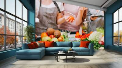 Culinary master class. Healthy food recipe. Women cooking with organic ingredients. Wall mural