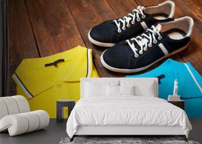 set of colorful men's t-shirts and sport shoes Wall mural