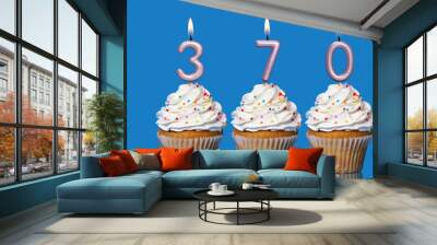 Birthday Cupcakes With Candles Lit Forming The Number 370 Wall mural