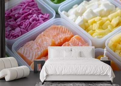 Colorful assortment of fresh vegetables and salmon in clear containers. Wall mural