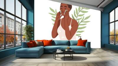 Black woman applying cleansing, moisturizing cream on face skin. Girl with vegan facial skincare essential, cosmetic beauty product. Flat graphic vector illustration isolated on white background Wall mural