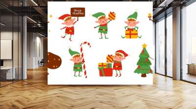 Collection of Christmas elves isolated on white background. Bundle of little Santa's helpers holding holiday gifts and decorations. Set of adorable cartoon characters. Flat vector illustration. Wall mural