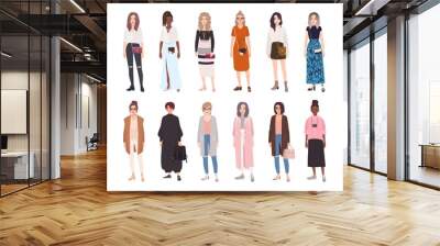 Collection of young women dressed in trendy clothes isolated on white background. Set of girls wearing stylish apparel. Bundle of street style outfits. Flat cartoon colorful vector illustration. Wall mural