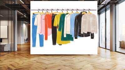 colored clothes or apparel hanging on hangers on garment rack or rail isolated on white background.  Wall mural