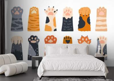 Different cartoon colored cat paws set vector graphic illustration. Collection of various cute cartoon domestic animal foot isolated on white background. Funny fur pet dangerous claws Wall mural