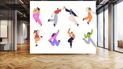 Happy characters jumping from joy, fun. Young excited people celebrating success, achievement. Free active men, women with positive energy. Flat vector illustrations set isolated on white background Wall mural