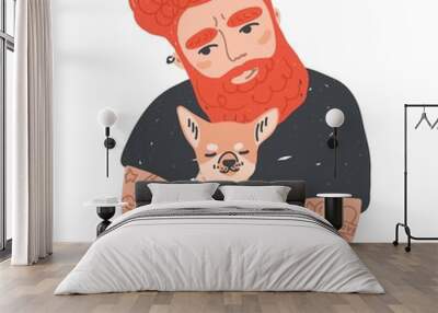 portrait of cute redhead bearded man with tattoos holding his dog or puppy. funny male cartoon chara Wall mural