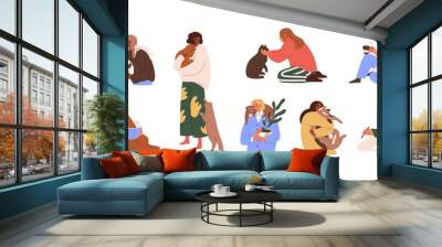 Set of women with domestic cats isolated on white background. Female pet owners resting and working with home animals. People spending time with cute kitties. Colored flat vector illustration Wall mural