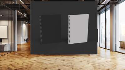 Two notebooks with spiral bound on black background Wall mural