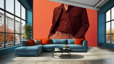 Confident man in chic brown attire and sunglasses Wall mural