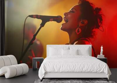 Female artist singing on stage in vibrant red lighting Wall mural