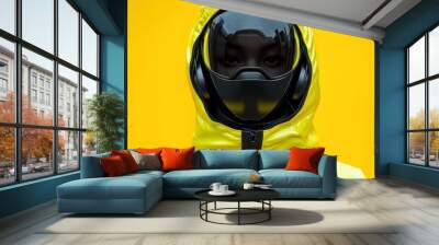 Innovative helmet design in vibrant yellow background. Wall mural