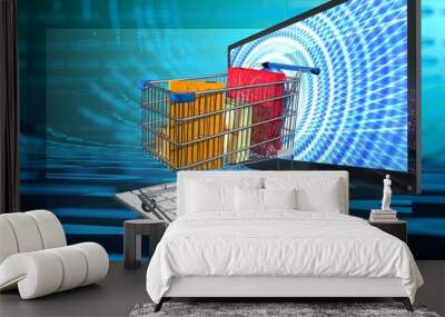 Shopping e commerce cart with presents and shopping bags on a computer keyboard, emerging from the computer screen, symbolizes online shopping, internet busines,blue binary digital background Wall mural