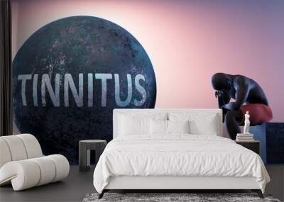 Tinnitus as a heavy weight in life - symbolized by a person in chains attached to a prisoner ball to show that Tinnitus can cause suffering, 3d illustration Wall mural