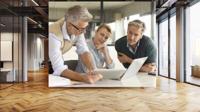 business people in a meeting using tablet Wall mural