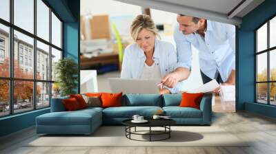 business people working in office on laptop Wall mural