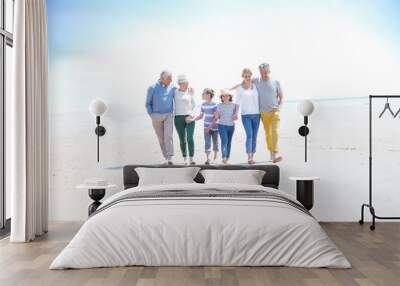 Family, parents, grandparents and grandkids walking on the beach Wall mural